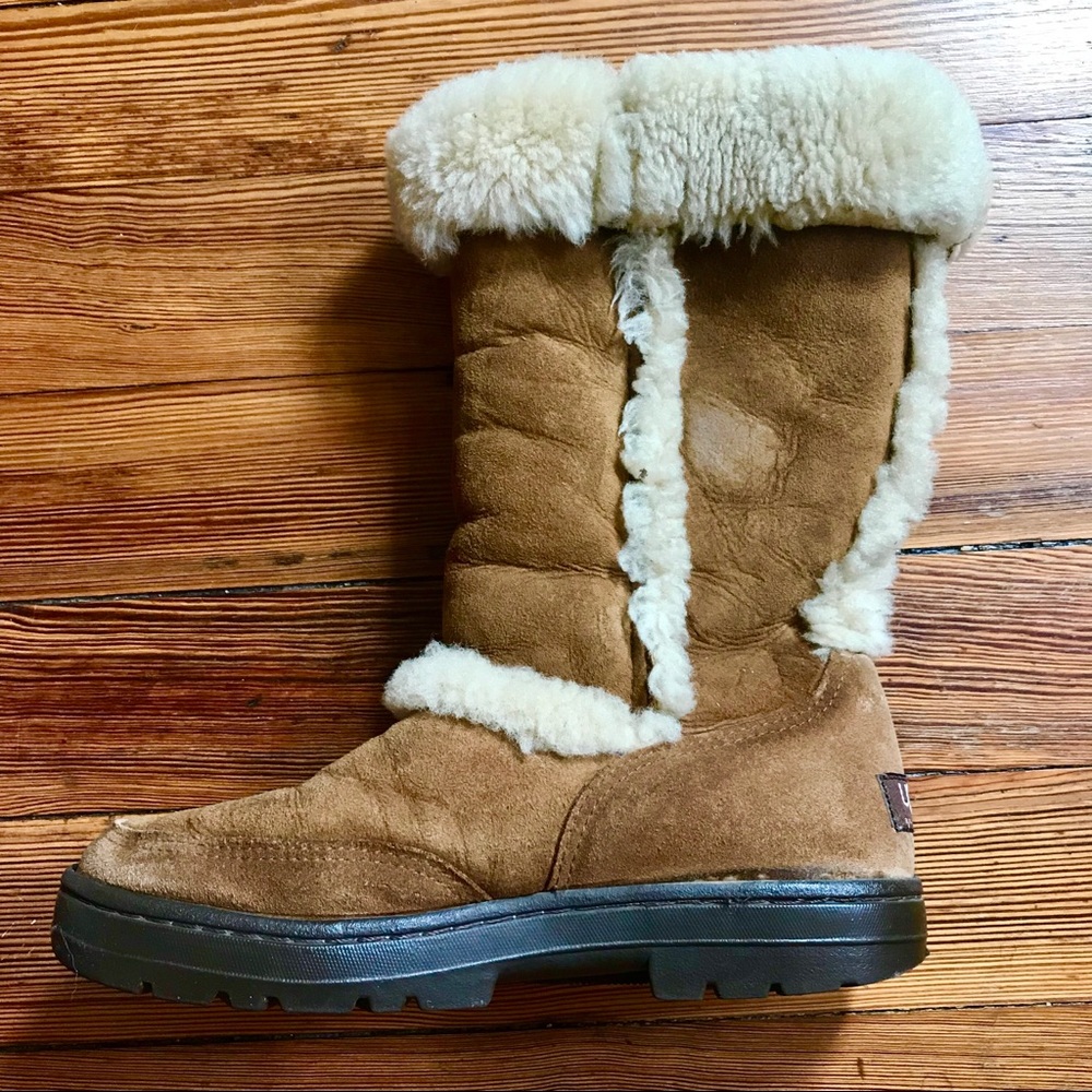 Tall fur-lined Ugg boots